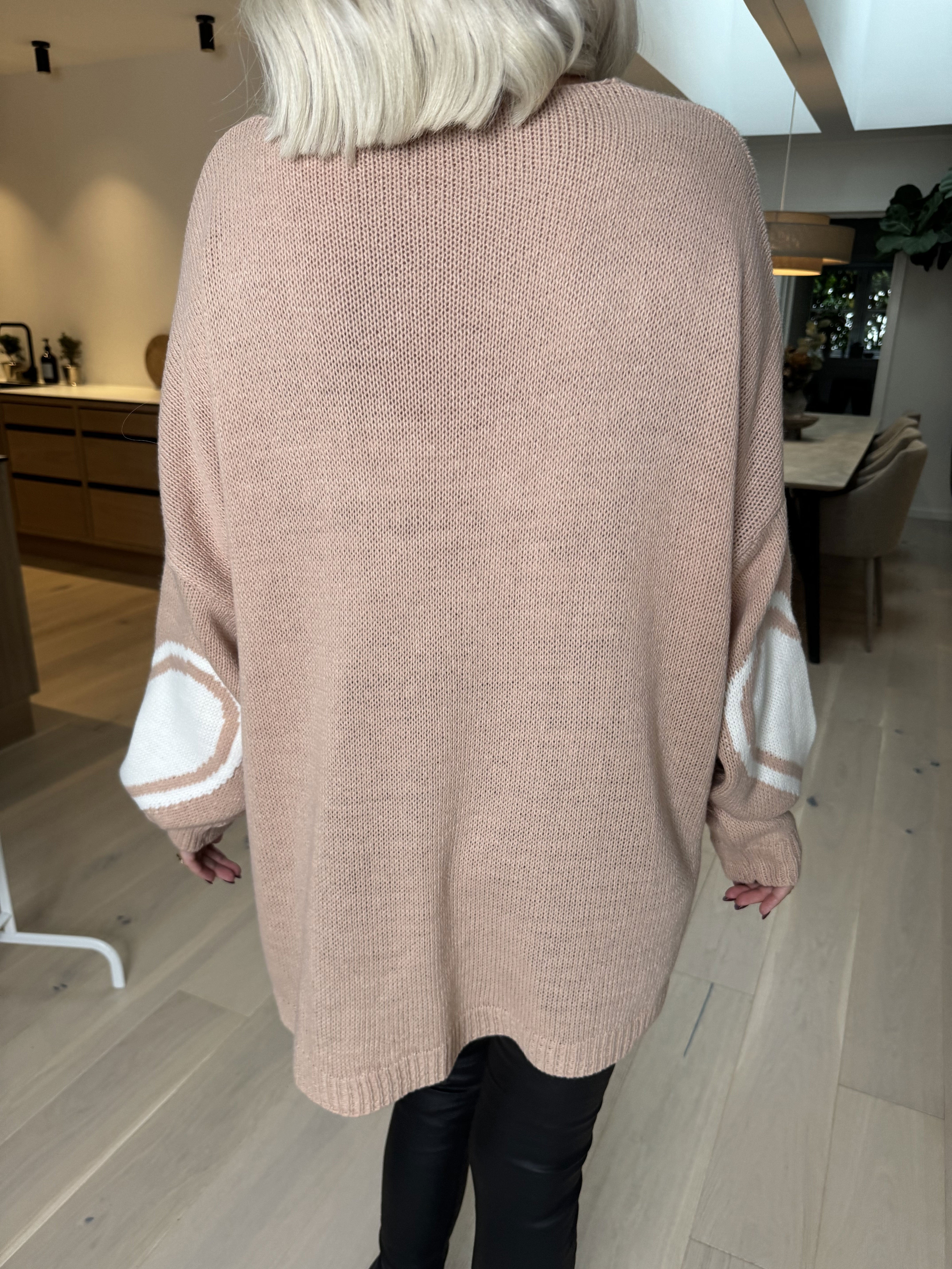 Lorena - Stickad blus med stort hjärta